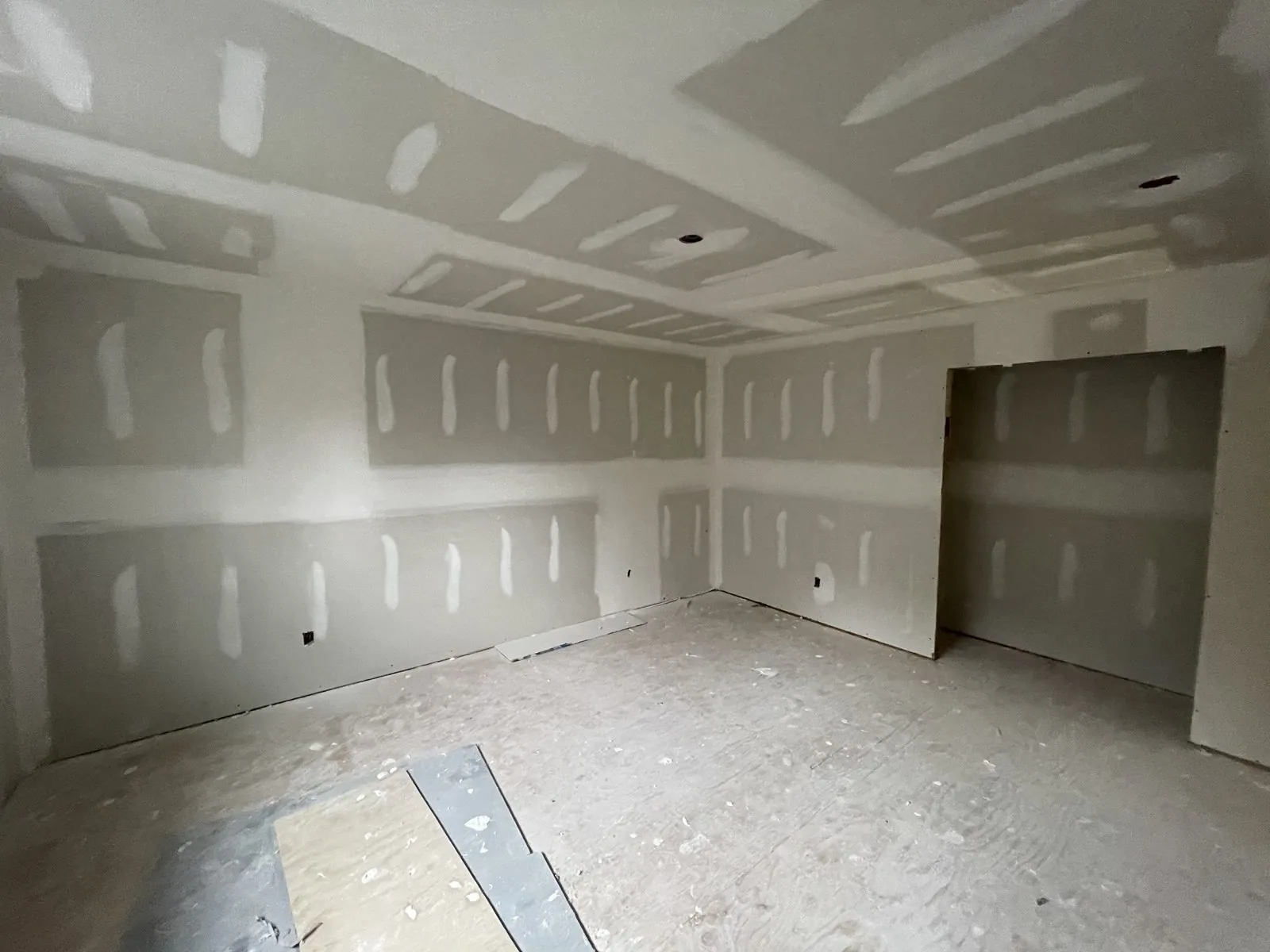 High two-storey ceiling drywall custom home