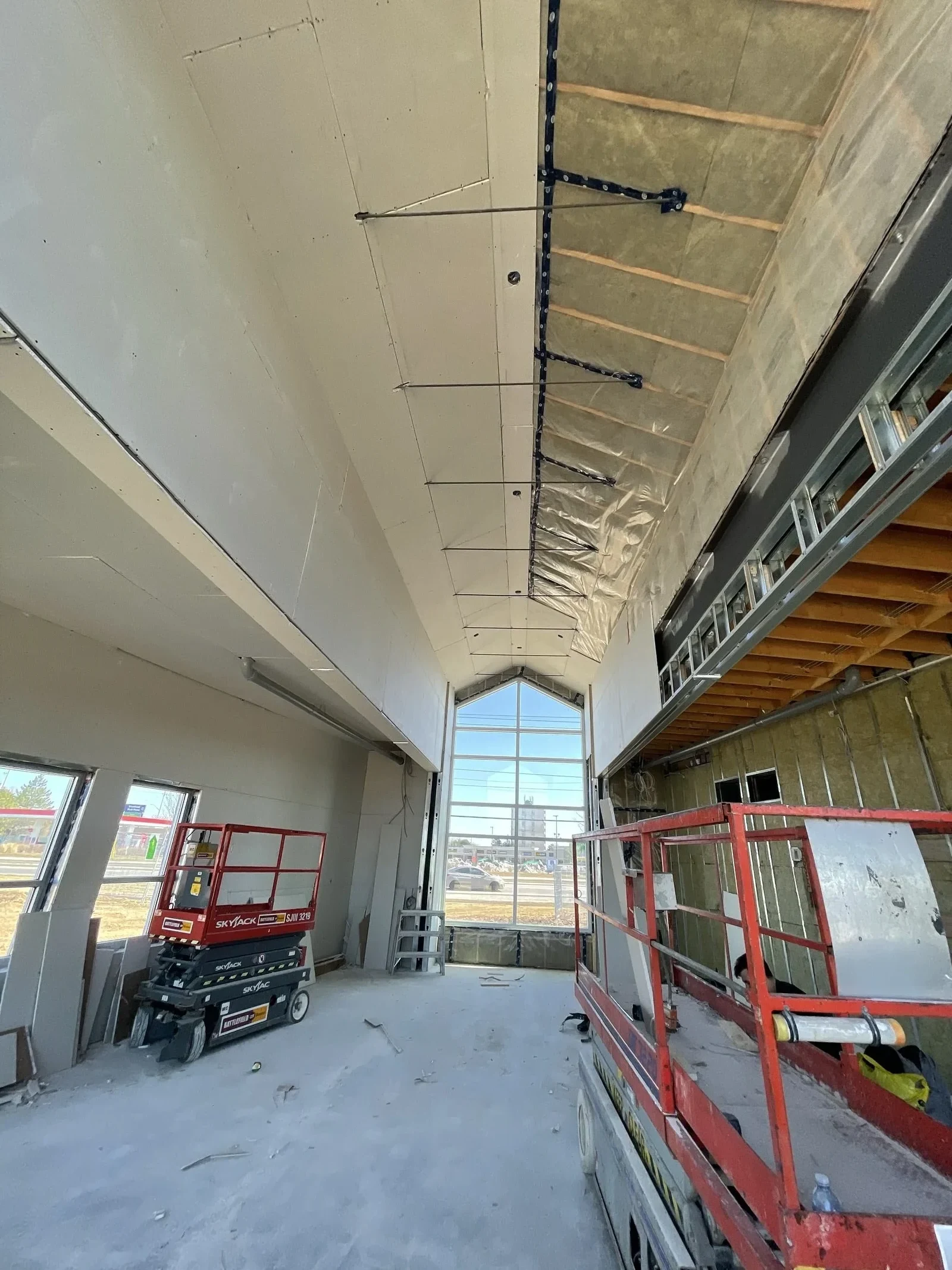 Commercial vaulted drywall complete